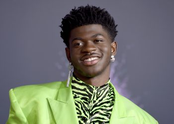 Lil Nas X arrives at the American Music Awards on Sunday, Nov. 24, 2019, at the Microsoft Theater in Los Angeles. (Photo by Jordan Strauss/Invision/AP)